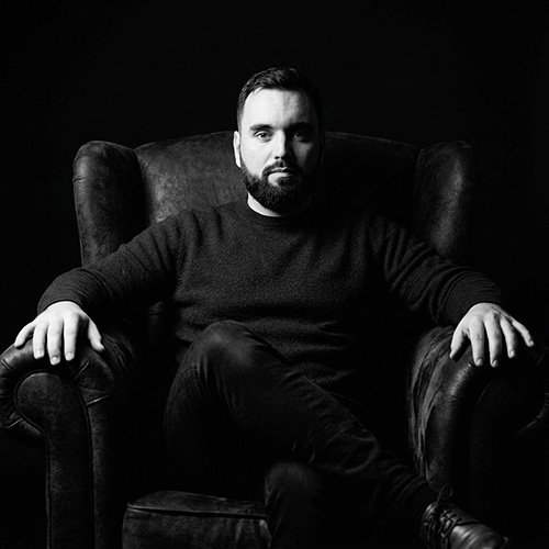 Vedran Obradović of Vizura Studio® seated in a black-and-white portrait
